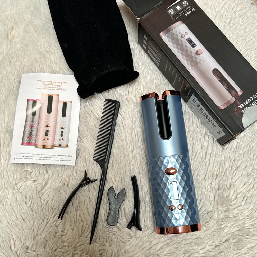 Automatic curling iron. Wireless USB Auto Curler with ceramic rotating curler.